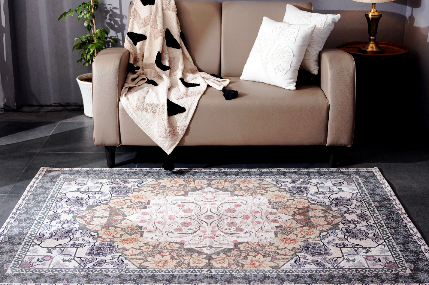 How to Use a Charcoal Rug as a Warm Anchor in Minimalist Interiors?